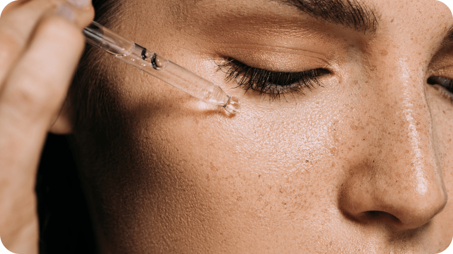 Woman using cleanser product