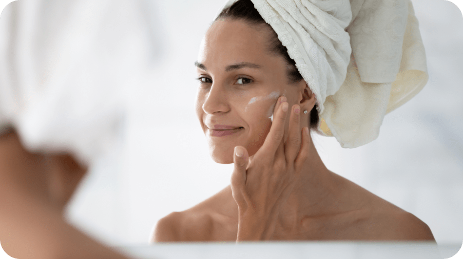 woman applying face care